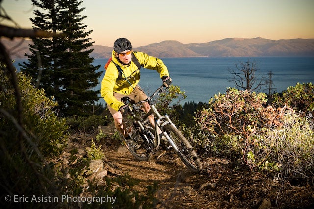 Jeremy Benson mountain biking. Photo by Eric Asistan. Jeremy Benson mountain biking above Lake Tahoe