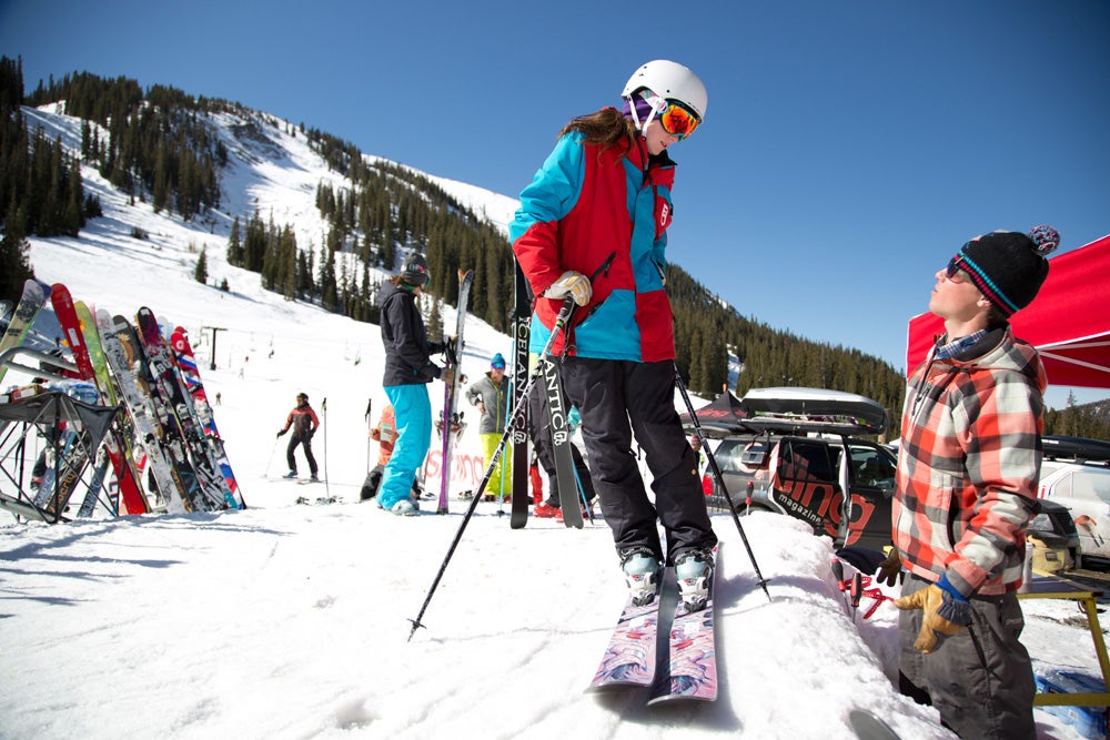 Making Laps Tester Claire Tabolt is fitted for another pair of skis by ski tech Brian Eggleton. Each tester skied nearly 20 skis per day.