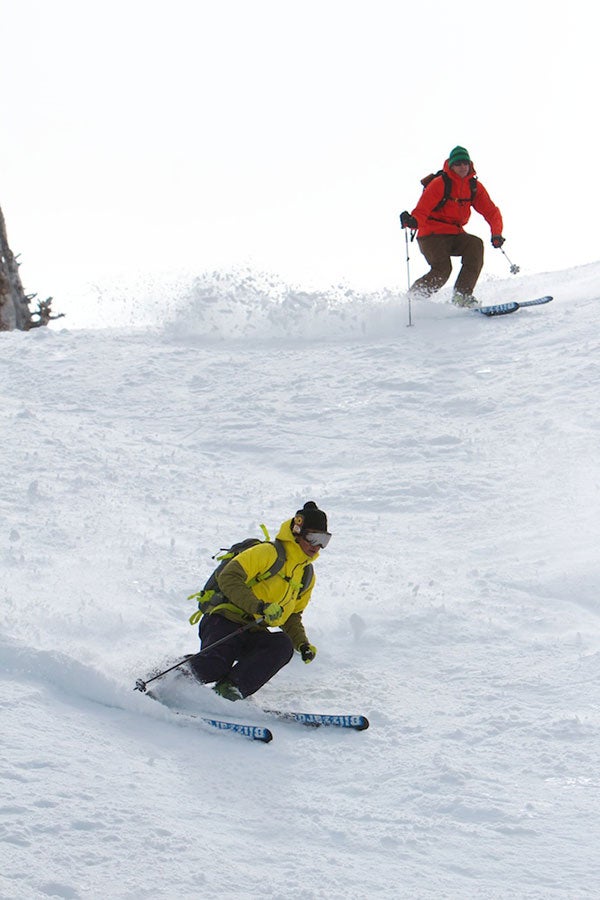 Blue Angel Steeze Guide John Morrison (rear) and David Rosenbarger ski off the summit of Mt. Anderson.