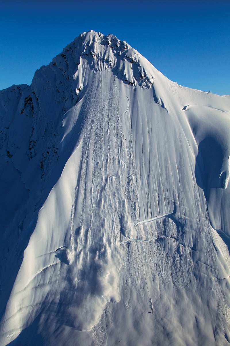 Last Chance As Reggie Crist shot down Rainbow Peak—a first descent—on the final day of heli ops in Alaska, photographer Will Wissman clicked the shutter even…