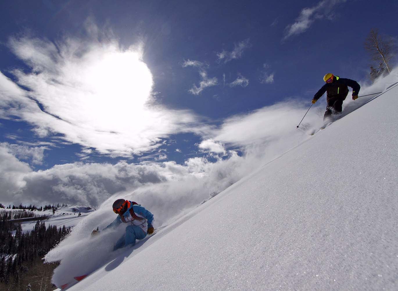 Pow Chasing Tim Dyer and Barclay Rabin kick up some snow. These guys always know where to find it.
