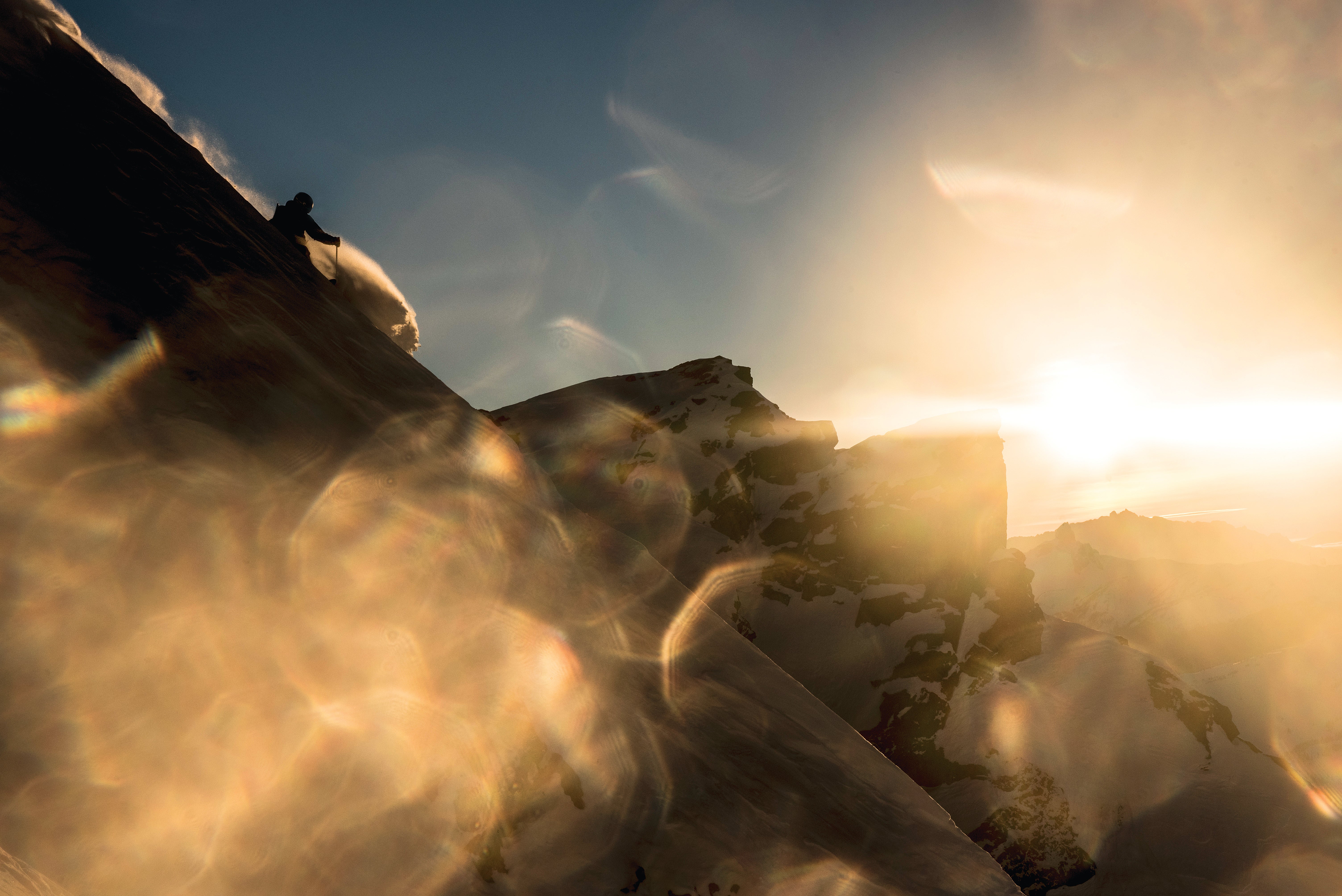 SKI1017_FOC_by_GuyFattal A PLACE IN THE SUN Photographer Guy Fattal and athlete Flo Goeller set out for a simple hike, hoping to see the sun vanish over the peaks outside of…