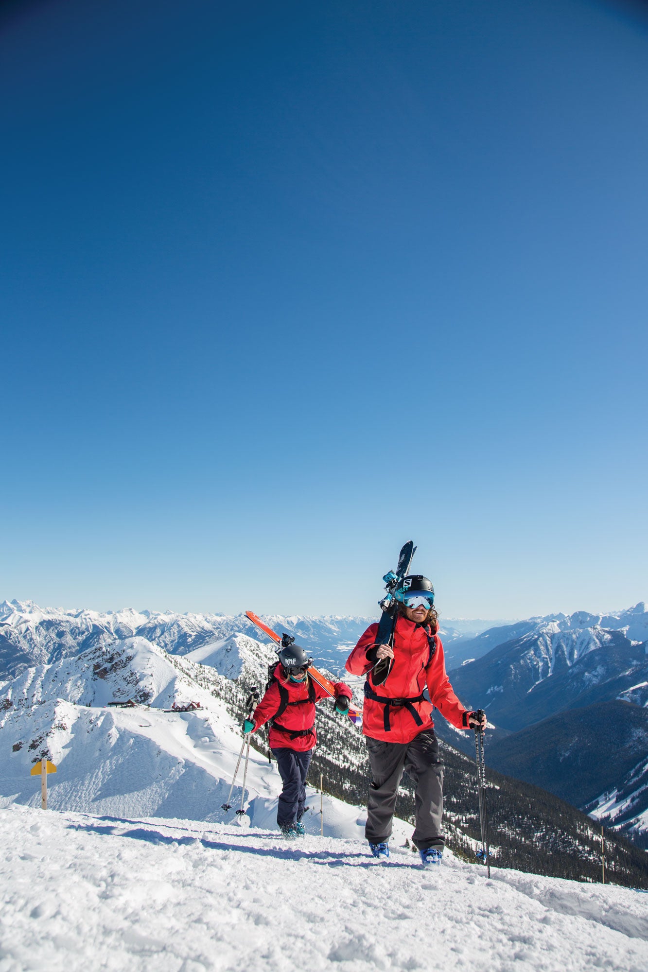 SKI1118-KickingHorse03-byKeriBascetta Wittstock and local ski coach and athlete Brenna Donaldson hike along the ridge on Blue Heaven to access Feuz Bowl.