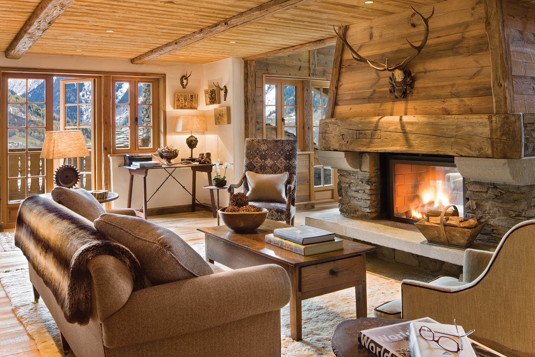 SKI1218-ELE04-DavidMarlowInteriors-s Chalet Pelerin is decorated with the traditional furniture of the region, which Eleven Experience designers often look to antique dealers to find.