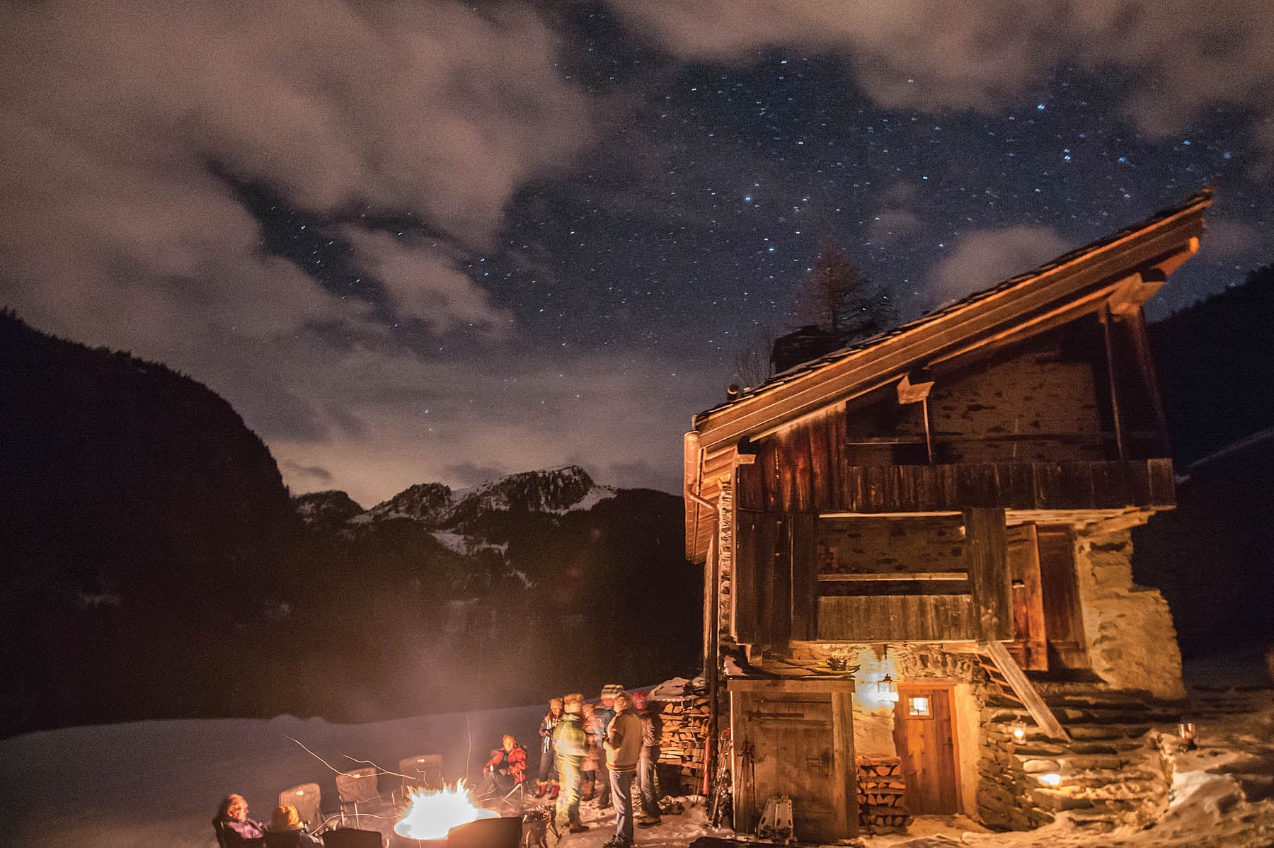 SKI1218-ELE09-Alpage_6-s A moonlight hike to the Alpage is a highlight of any Chalet Pelerin stay. The two-mile hike or snowshoe culminates in a delicious traditional meal…