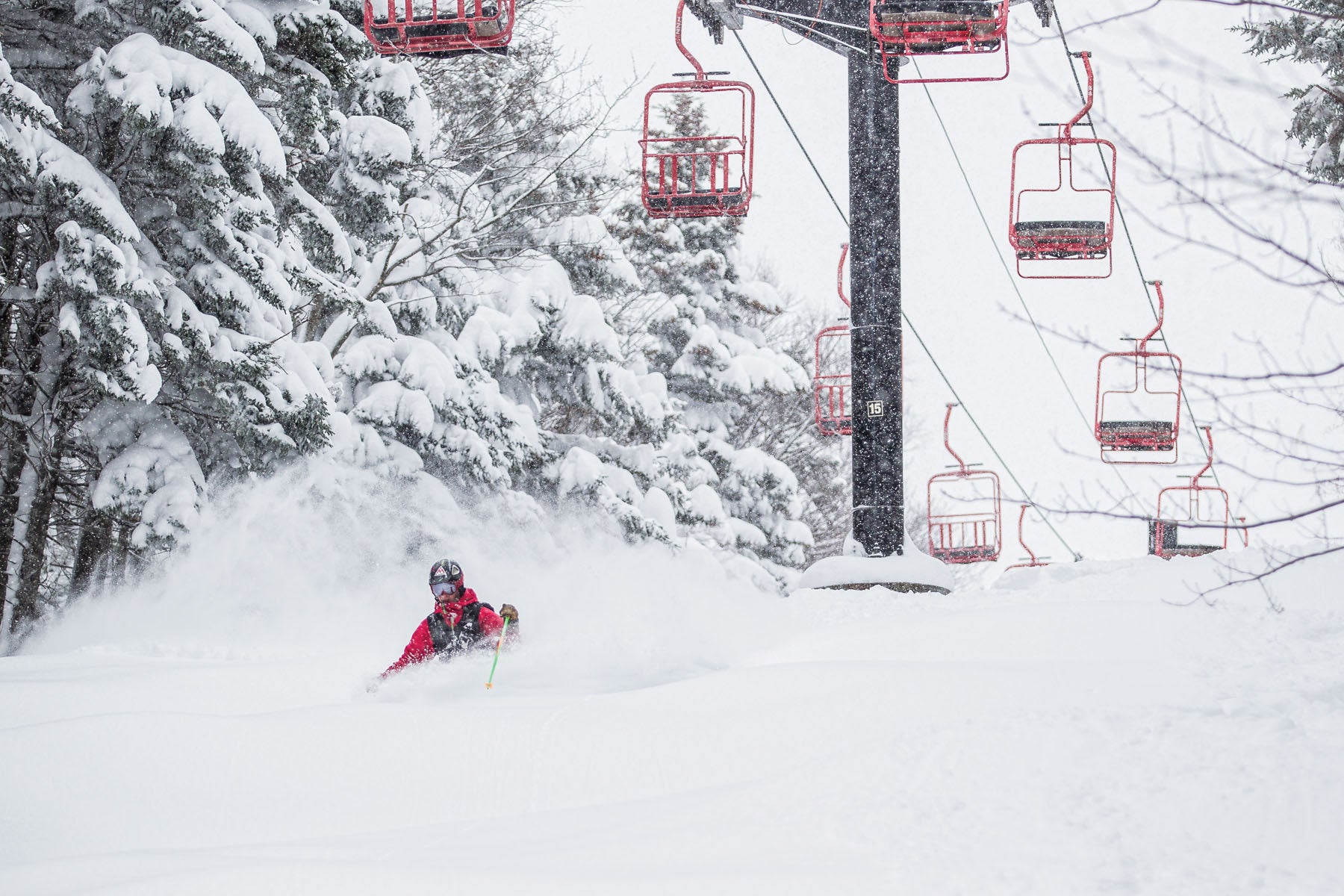 SKI1018-TRA1-MagicMtn-byJustinCash Chest deep and loving it beneath Magic Mountain's iconic Red Chair