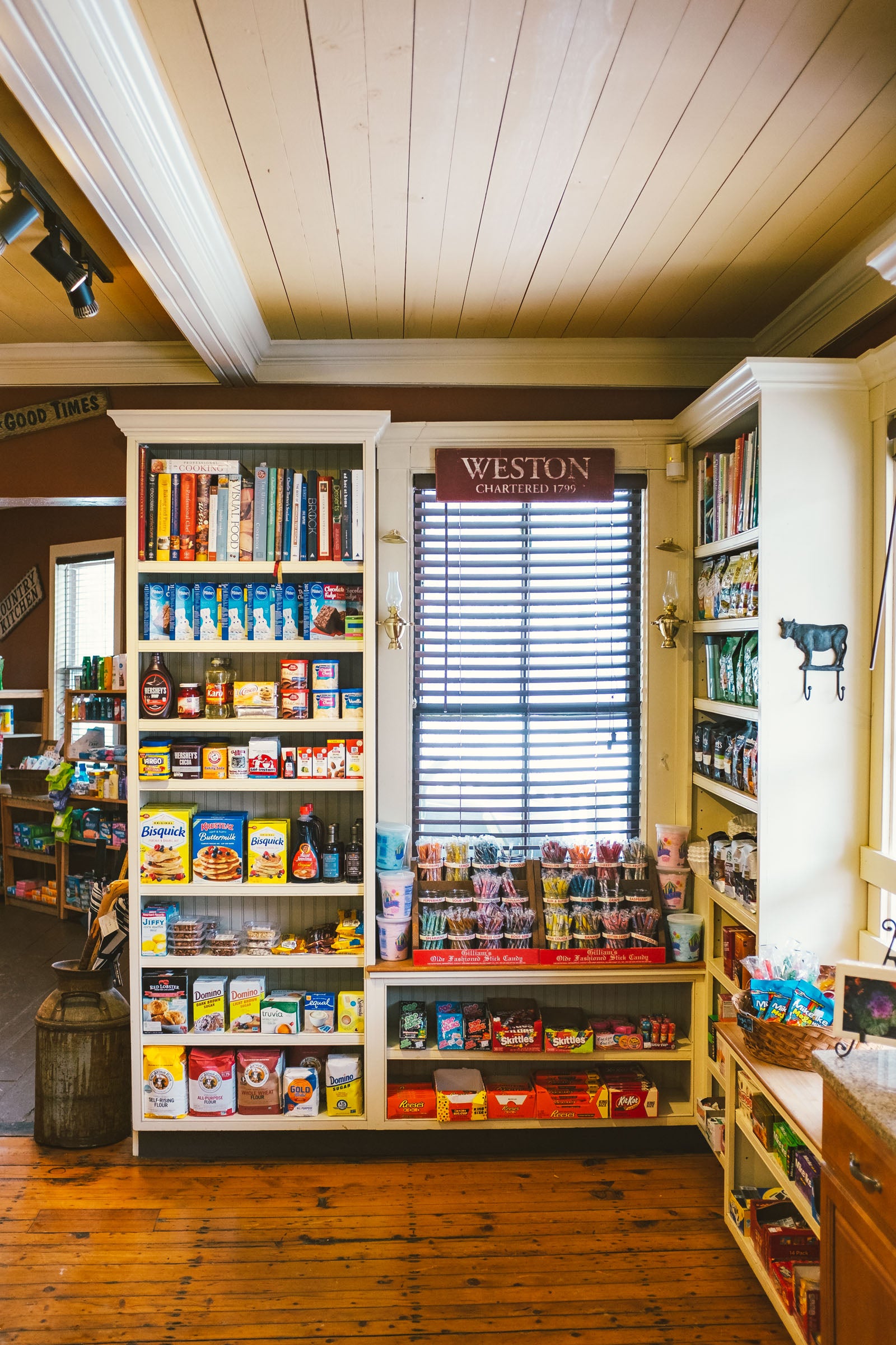WEB JCash_Stratton_DSF4776 copy Inside of a small store with full shelves of food, books, and candy in Stratton, Vermont