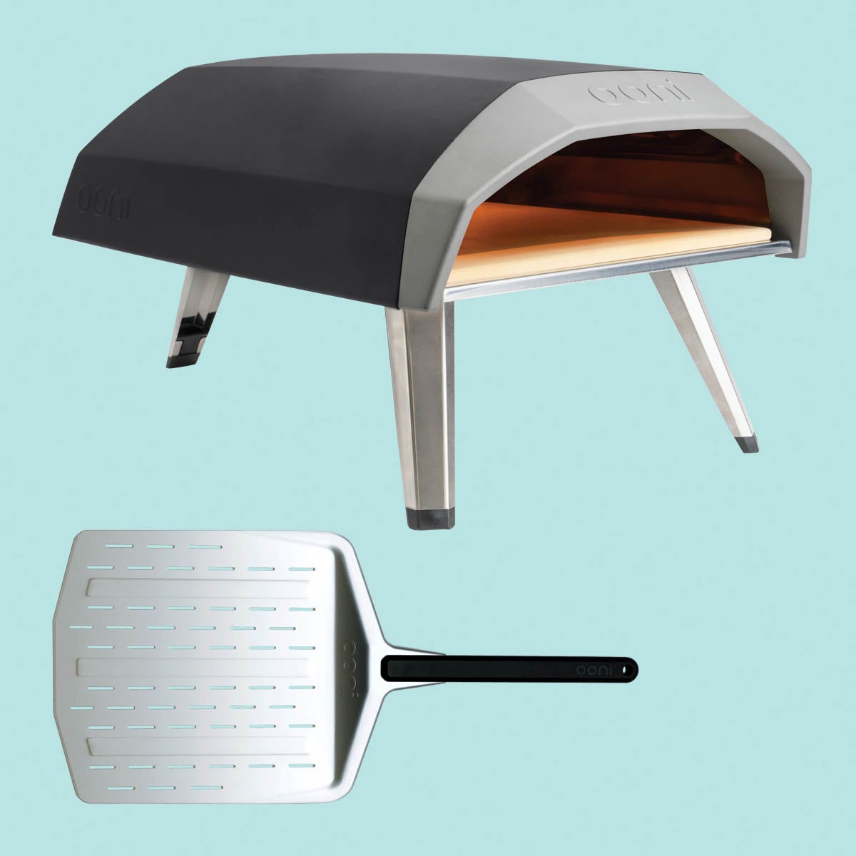 SKI0120-TOO-OoniKoda Ooni Koda gas-powered pizza oven and perforated pizza peel.