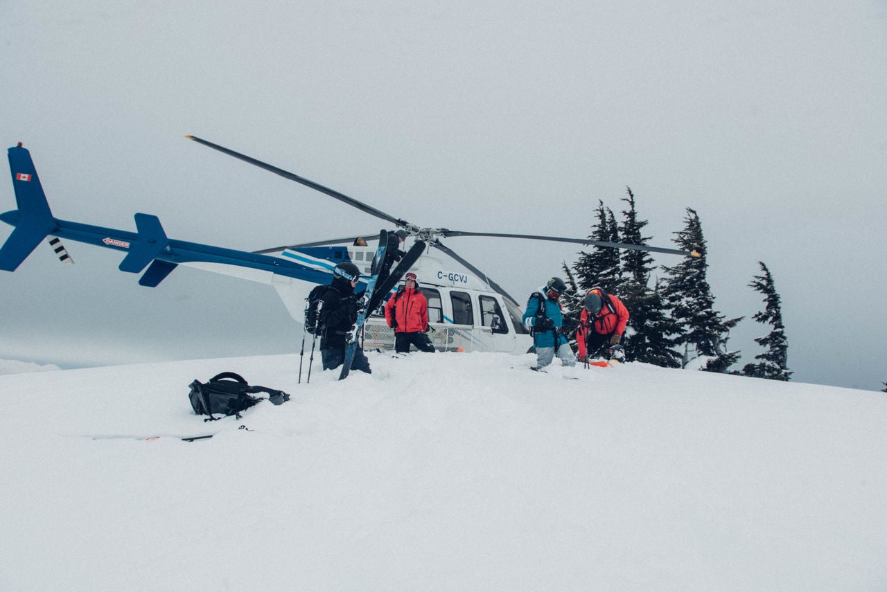 Maggie_Voisin_200228_Northen Escape BC_DSC00820 Maggie Voisin and skiers unload helicopter in British Columbia with Northern Escape Heli skiing.