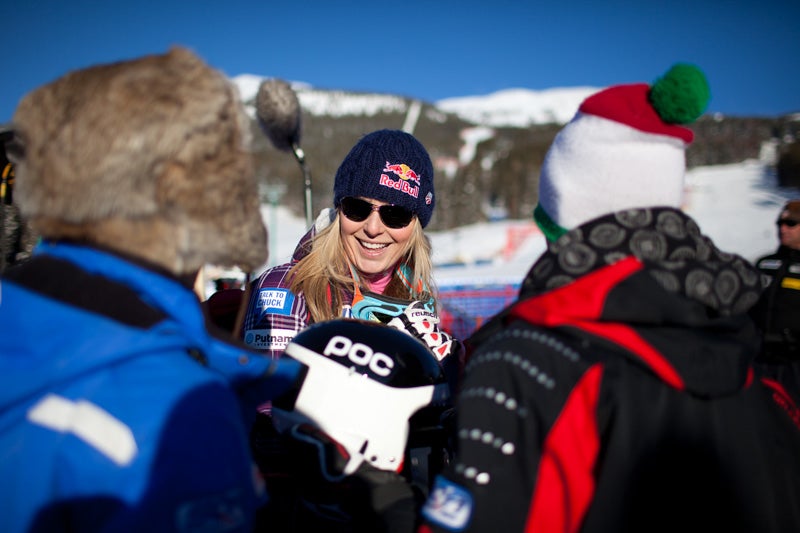 Lindsey Vonn signs autographs for fans in the finish area after placing second, for the second straight day, in the women's downhill None