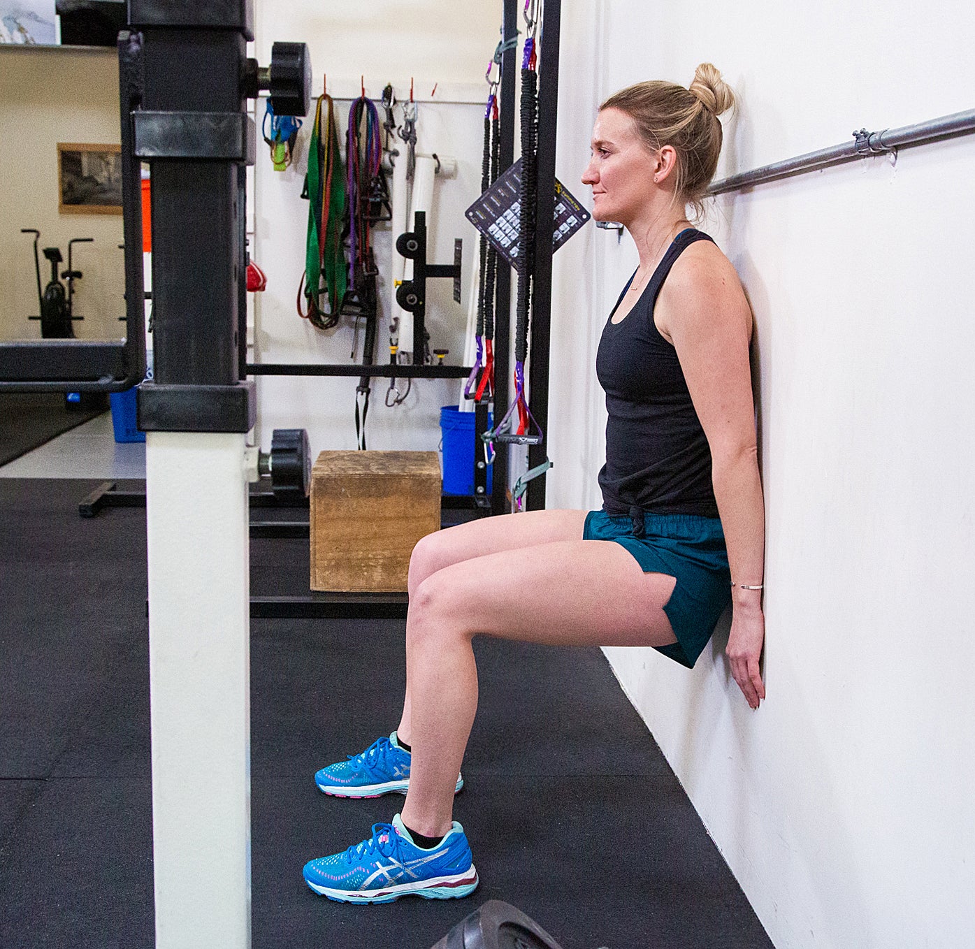 wall-sit-982 Jessi Hackett performs a wall sit at the Alpine Training Center, Boulder, Colo.