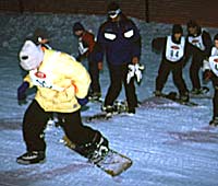 "The helicopter waits for guide Dylan Freed to load up."