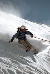 Warren Miller's <I>Storm</I> Charlotte Moats carves up the Alaskan steeps during the filming of Warren Miller's Storm. Photo by Mark Weaver.