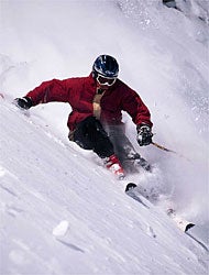 ER 3 Hoping to stay away from the TV show, Gary Carruthers carves ER 3 at Lake Louise.