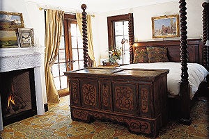 Mountain Life, Feb 2005 HIGH ALIPNE STYLE: Rich wood furniture warms up the master bedroom while white walls keep it airy.