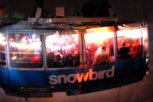 US Nationals- Tram Party Some 140 athletes, team managers, and assorted VIPs jammed into Snowbird's two trams and partied it up last weekend some 200 feet off the deck.