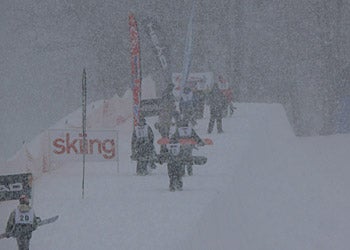 Mount Snow, VT Jibbers hiking in a blizzard to compete in the Suzuki Halfpipe Jam. Mount Snow received two feet from the latest storm. PHOTO: Rob Hudson
