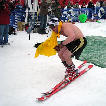 Full Momentum We can't tell if this competitor is ecstatic that he made it across, or if he's going into hypothermic shock. It's probably a little bit of both.