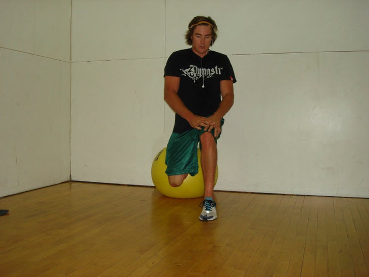 Lunge Swiss Ball In a lunge with your left leg resting on a Swiss ball, this gives a deep stretch for the quad.