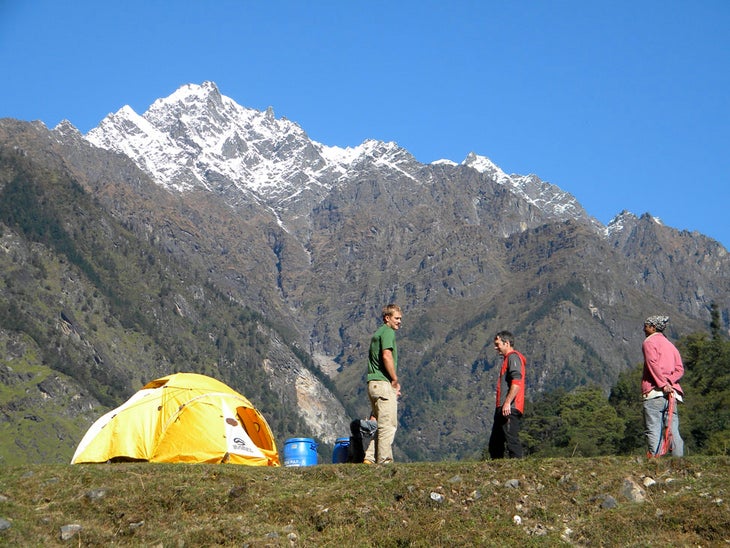 Base Camp Cook Jamie Laidlaw, Kris Erickson, and our Nepali cook Sontoss at base camp.