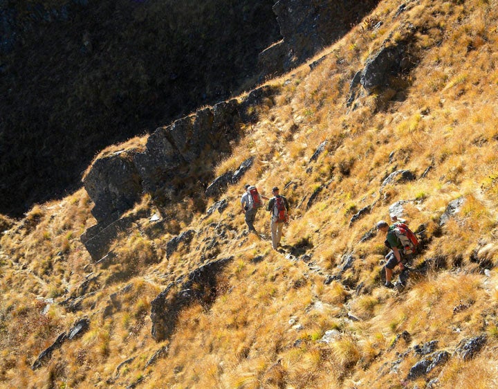 Now That's What We Call a Trail A different route out of the mountains took us over a 13,000-foot pass with plenty of nimble footing. From left, Kip Garre, Kris Erickson, Jamie…