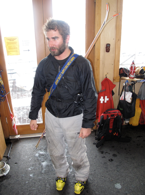 How to Carry Your Skis on a Bootpack: Step 5 Here's Peter showing the finished result. Now you can head up the bootpack with just your poles in your hands.