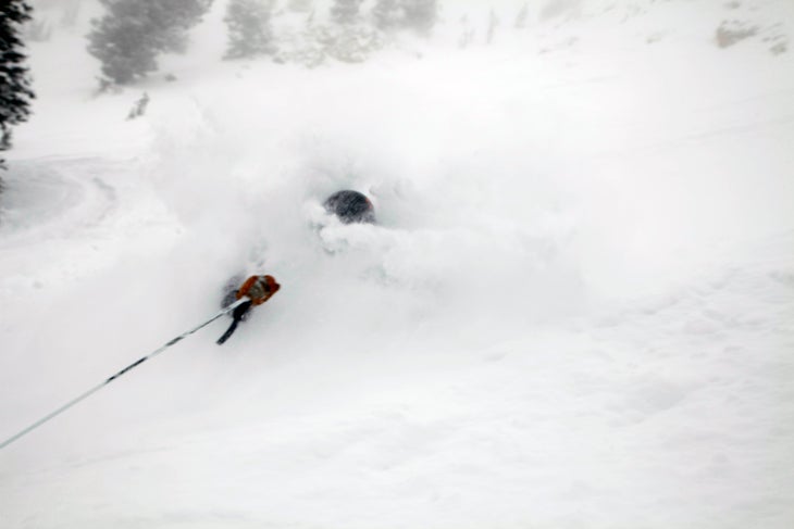 Mark Lesh in the White Room Skiing's art director, Mark Lesh, stuff his face with powder while testing how the skis react in the white room.