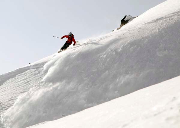 Valdez, AK Paul Kimbrough bush-wacks his through the powder. Here's another tele tip from Paul: