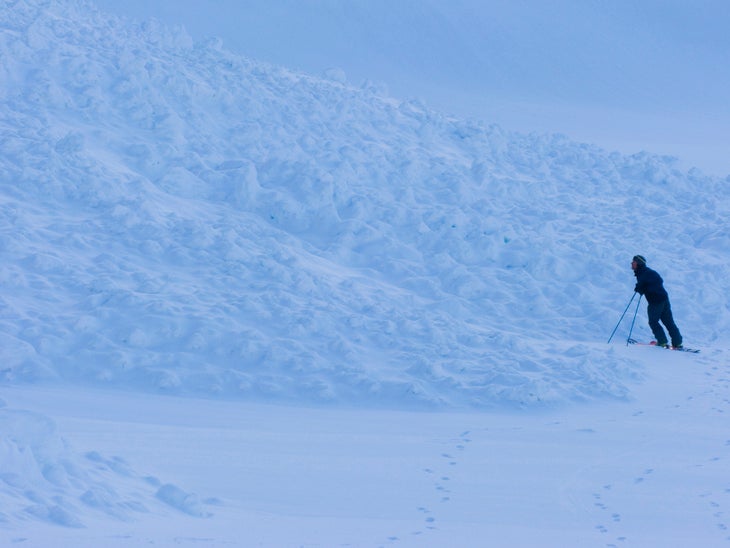 1696.jpg When we arrived at the backside of the mountain, we saw that it had slid to the ground in spots. Greg didn't think it was a good idea and neither did…