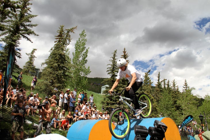 Teva Mountain Games 2010 A cyclist tops an obstacle in the Xing Tea Freeride Dual.