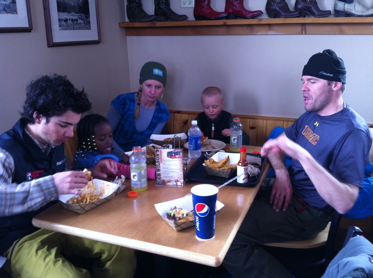3/24: Lunch at Nick Wilson's Cowboy Cafe Here, I attempt explaining to my family that they'll all be in ski school come morning so dad can have his own shred time.