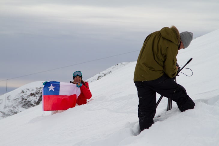 Discrete team members Jon Roderick, right, and athlete Rachael Burks shoot an interview at the end of the day. None