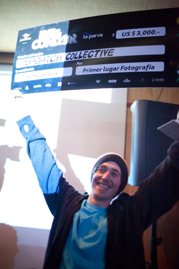 Team DubSatch's photographer, who the Utah boys nicknamed Big Bird, claims his giant check. None