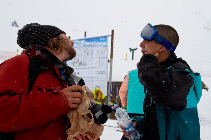Team Klint's Brian Kish shows off a tooth he had just chipped to photographer Christopher Lisle on day one of the Eye of the Condor in La Parva, Chile. None