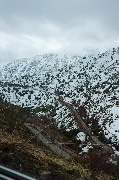 The view of the road, which contains 43 switchbacks, on the drive to La Parva from Santiago, Chile, for the Eye of the Condor event. None