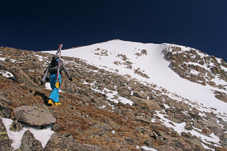 Alpine Tundra Editor Sam Bass does a little rock hopping at the saddle below Mt. Toll.