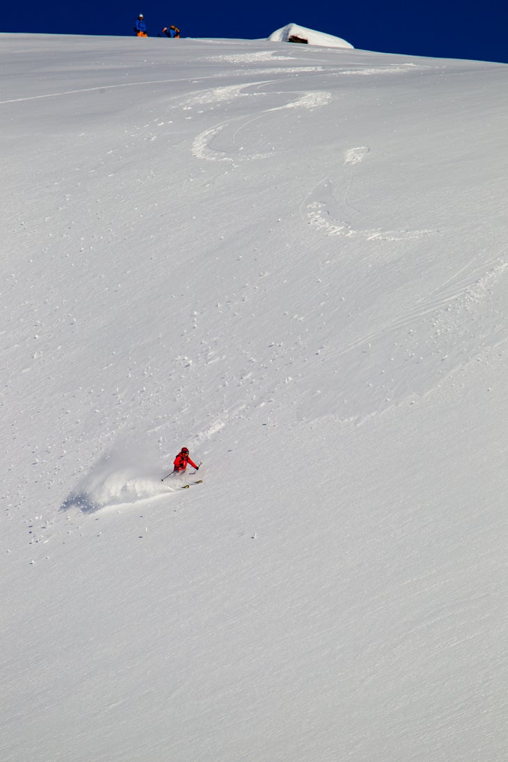 Sunshine Slashing Jackie Paaso makes good on the one of the first week's few sunny and soft snow days. After a few laps in this particular amphitheatre, we farmed a…