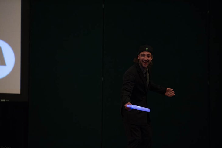 Cosmic Frisbee. Colby James West tosses the hippie disc just before the athlete press conference. Photographer: Will Wissman.