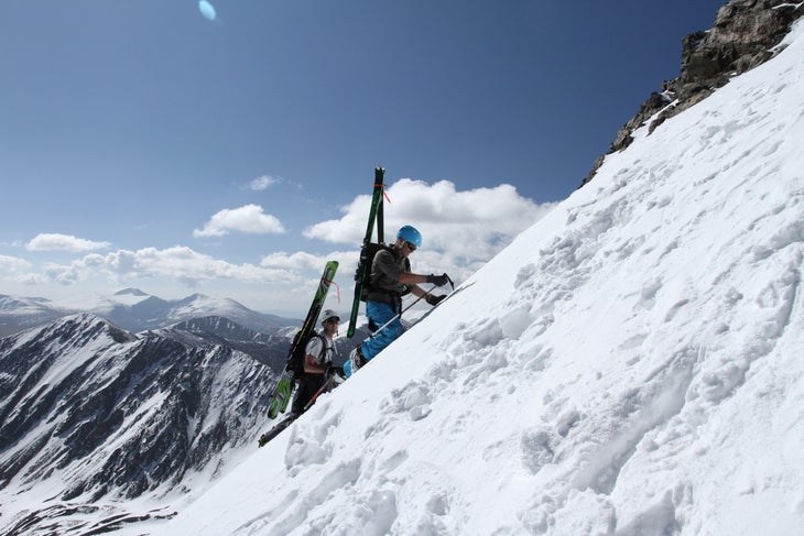 Halfway We walked to the snowline in sneakers, then booted up the chute with axes and crampons.