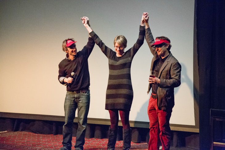 Superwoman Sally Sally shares a moment with Chris Denny and Eric Henderson of Jackson-based PR firm Denny Ink. Sally was working for Denny Ink at the time of the…