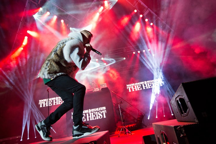 Is that a Tebow? You can take the QB out of the city, but his actions still linger... Macklemore fighting the urge.
