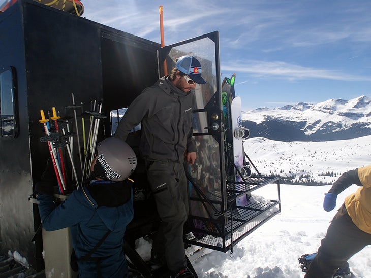 Unloading Everyone piles out of the cat while the guides unload.