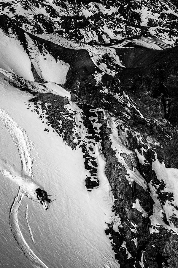 Hang on Tight Rugged terrain with stomach-in-throat steeps is a hallmark of Valle Nevado’s sidecountry. Here Tom Winter takes advantage of yet another easy-access…