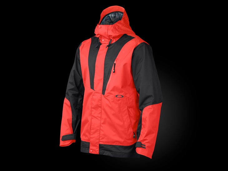 Oakley Banfield Key Features: - Waterproof/breathable - Media pocket with touch panel - Magnetic hood keeps hood down when skiing - Recco reflector - Simon Dumont…