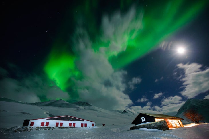 Arctic Magic The Northern lights move across the sky above Arctic Heli’s ski barn and sauna hut like clouds—in strange shapes and at different speeds. It’s…
