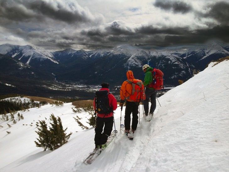 Scoping Lines Scoping lines is easy when the terrain looks like this and the snow seems bottomless. Here TJ David, Craig Moore, and Greg Fortin scope lines in…