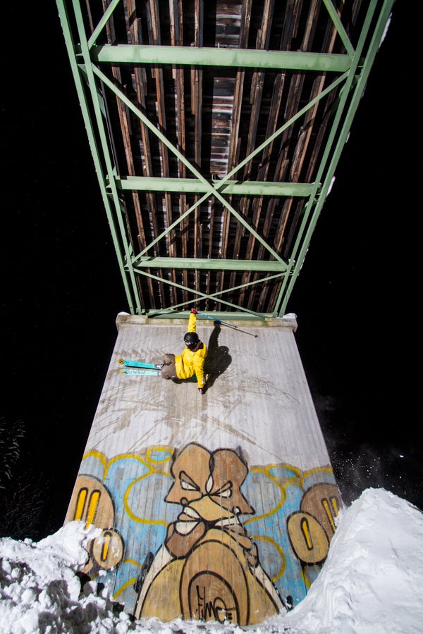 Wall Ride Andreas Sjöbeck wall rides a frosty graffiti-ridden concrete support to a skier bridge in Vemdalsskalet, Sweden.