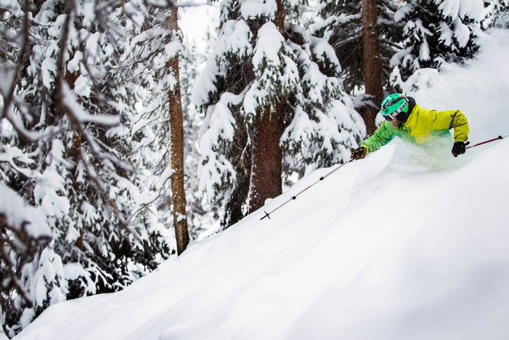 Arapahoe Basin Skier Patrick “Kuru” Gannon chokes on a foot of fresh powder on the Pali in late January 2014. Dumping 22 inches in two days, the white stuff never…