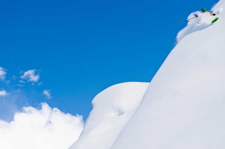 Sun Valley Photographer Tal Roberts captured skier Danny Walton at the top of the world on a bluebird day at Sun Valley.