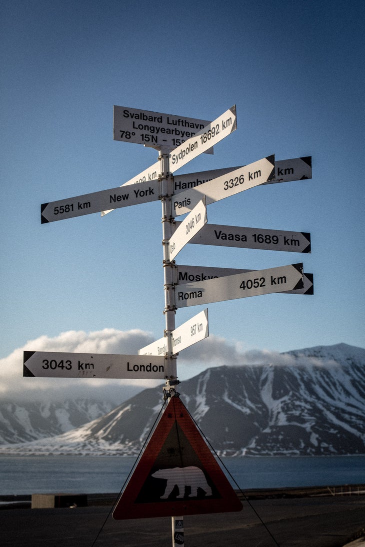 Far From Home “At the entrance to the Svalbard airport is this sign, which reminds you how far you are from anywhere else. It also reminds you that polar bears…